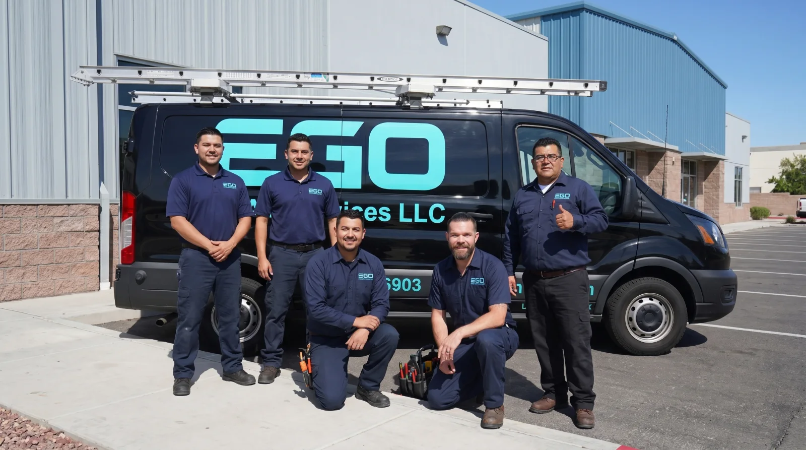 The EGO HVAC Services team with a company service van in Las Vegas